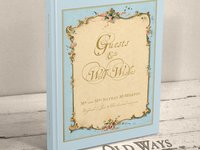 traditional hardcover personalized wedding guest book featuring and antique french cottage style frame in blue personalized with names and wedding date
